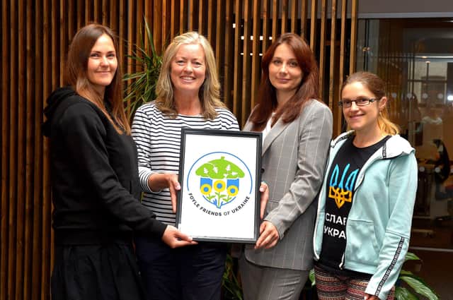 Dr Dina Diurba, Susan Thomas,  Dr Marina Sukhorukova and Tania Norynchak. Dina, Marina and Tania are Ukrainian refugees who are working with Foyle Friends of Ukraine to help match Ukrainian refugees with people in Derry. Susan is hosting Tania and her family and is also working with the organisation. Photo: George Sweeney.  DER2220GS – 027