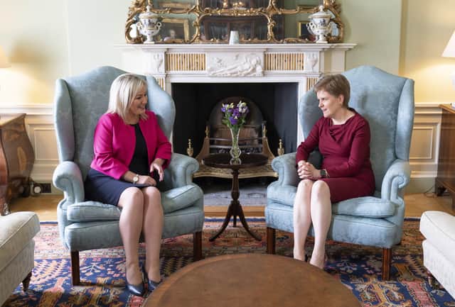 EDINBURGH, SCOTLAND - MAY 20: First Minister Nicola Sturgeon (R) and Sinn Fein Vice President Michelle O'Neill ahead of a meeting at Bute House on May 20, 2022 in Edinburgh, Scotland. O'Neill became the leader of the largest party in the Northern Ireland Assembly after recent elections. O'Neill and Sturgeon met to discuss areas of common ground including the cost of living crisis, the Northern Ireland Protocol and the formation of the new Northern Ireland Executive. (Photo by Jane Barlow - Pool / Getty Images)