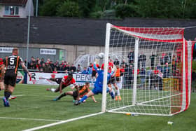 James Akintunde found the net for Derry but it wasn't enough as Dundalk struck late through Pat Hoban.