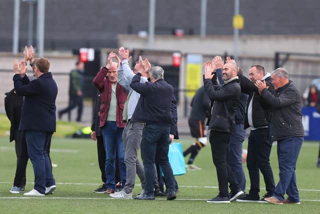 Members of Derry City's 1997 Premier Division title winning team are presented to the Brandywell attendance during half-time. Photo by Kevin Moore.