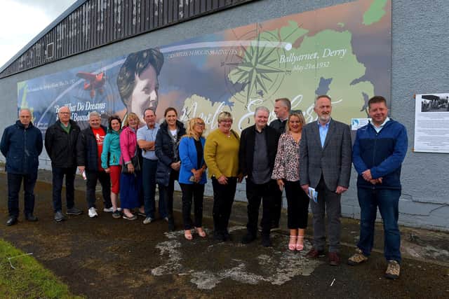 Group pictured at the unveiling of a mural commemorating the 90th Anniversary of the landing of Amelia Earhart in Derry on the gable wall of the Galliagh Spar (Co-Op) on Friday afternoon last. Included in the photograph are Ollie Green, Colr Maeve O’Neill, Mary Casey, Angela Askin, DSDC, Ciara Ferguson MLA, Colr Angela Dobbins, artist Joseph Campbell, Colr Sandra Duffy, Cathal Crumley, CRJ and Colr Conor Heaney.  Photo: George Sweeney.  DER2220GS – 065