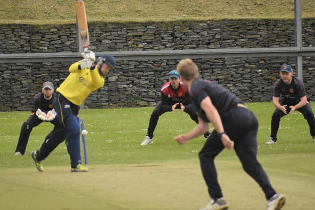 Fox Lodge's Gareth Heywood is bowled by The Hills' Dylan Blignaut. Picture by Lawrence Moore
