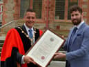 Endurance athlete and Health and Wellbeing Campion Danny Quigley pictured with Mayor Graham Warke after he was conferred with the Freedom of the City and Strabane, at a special ceremony in the Guildhall, on Monday afternoon.  Photo: George Sweeney.  DER222GS – 004