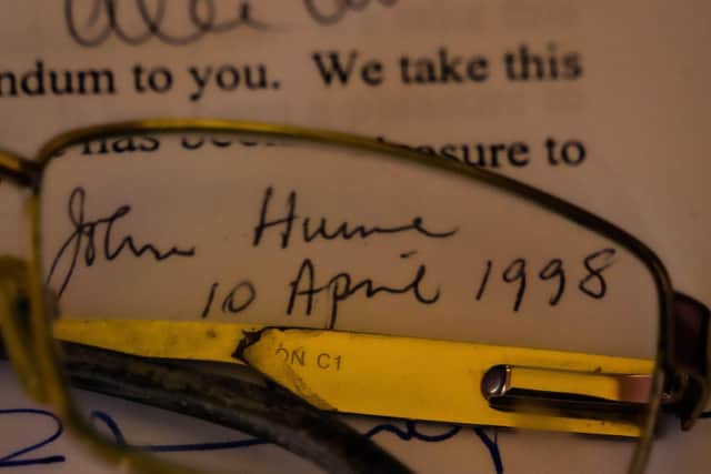 Original signed copy of Good Friday Agreement and John Hume’s glasses.