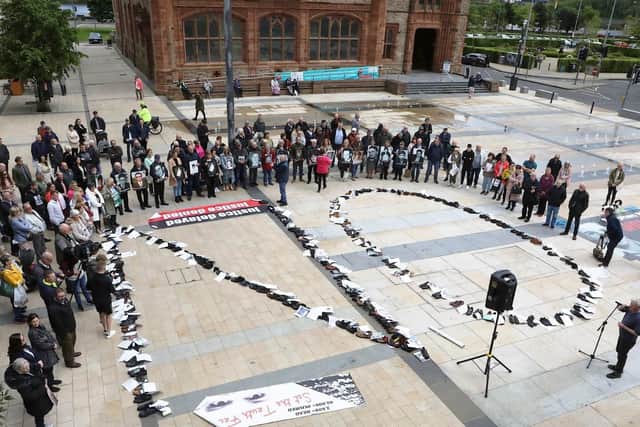 Protesters in Derry spelled out the word "no" using the shoes of victims.