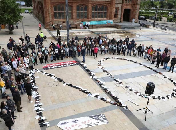 Protesters in Derry spelled out the word "no" using the shoes of victims.