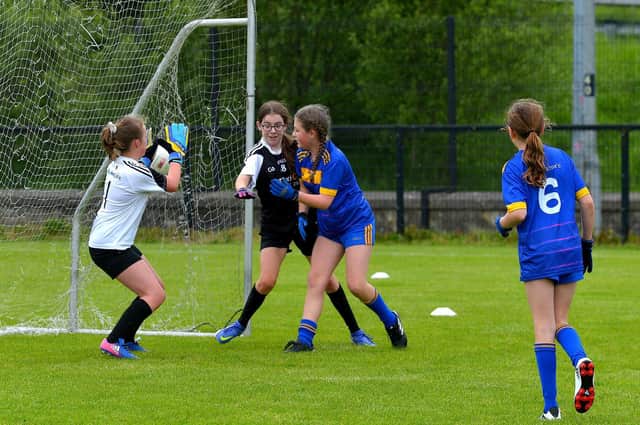 St Therese ‘purple’ score a goal against St Brigid’s during the recent Steelstown Primary Schools Girls Cup, at Páirc Brid. DER2220GS-054 Picture by George Sweeney.