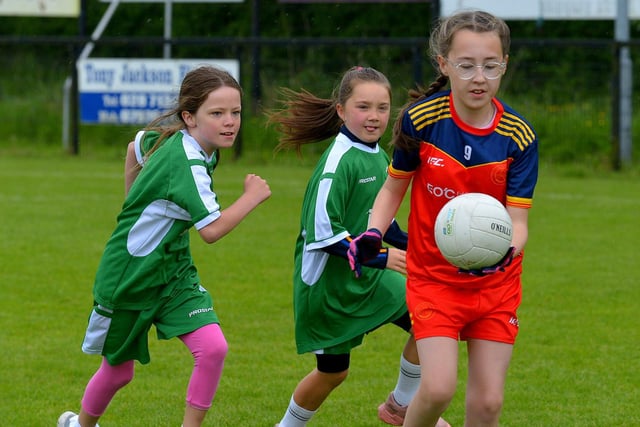 Steelstown and Bunscoil Cholmcille in action during the recent Steelstown Primary Schools (Girls) Cup, at Páirc Brid. DER2220GS-053 Picture by George Sweeney.