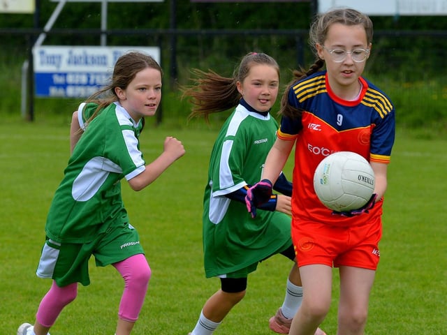 Steelstown and Bunscoil Cholmcille in action during the recent Steelstown Primary Schools (Girls) Cup, at Páirc Brid. DER2220GS-053 Picture by George Sweeney.