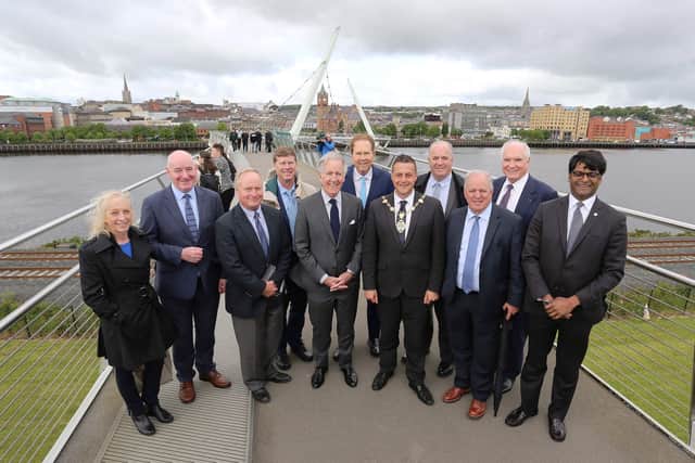 The US Congressional delegation with local representatives in Derry on Wednesday. Photo: Lorcan Doherty