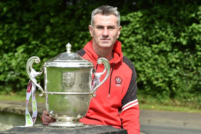 Derry senior football manager Rory Gallagher with the Anglo Celt Cup at last week's Ulster Championship Final press event.