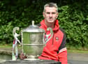 Derry senior football manager Rory Gallagher with the Anglo Celt Cup at last week's Ulster Championship Final press event.