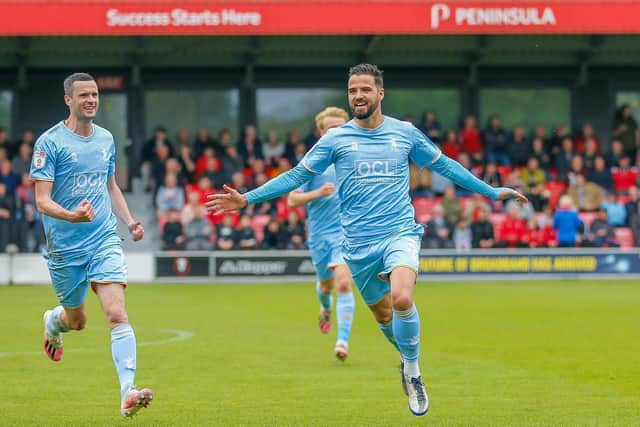 Mansfield Town's Stephen McLaughlin celebrates scoring in their win over Salford City in May. Picture by Chris Holloway / The Bigger Picture.media