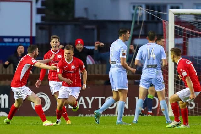 Seamas Keogh races away to celebrate his last gasp winner against Derry City on Monday night at the Sligo Showgrounds. Photograph by Kevin Moore.