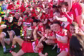 Derry players celebrate in Clones after defeating Donegal to become Ulster senior football champions