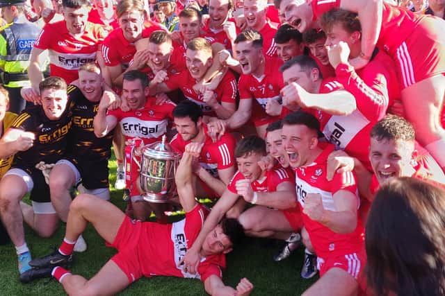 Derry players celebrate in Clones after defeating Donegal to become Ulster senior football champions