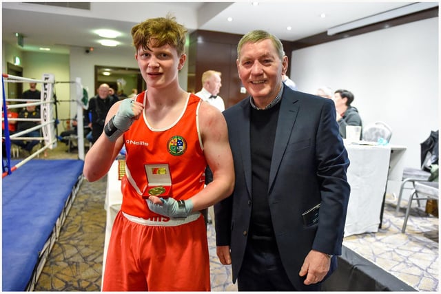 Ruairi Holmes ,Oakleaf is presented with his prize by former European lightweight champion and world title contender Charlie Nash after his win over Ben Berniet (Waterside).