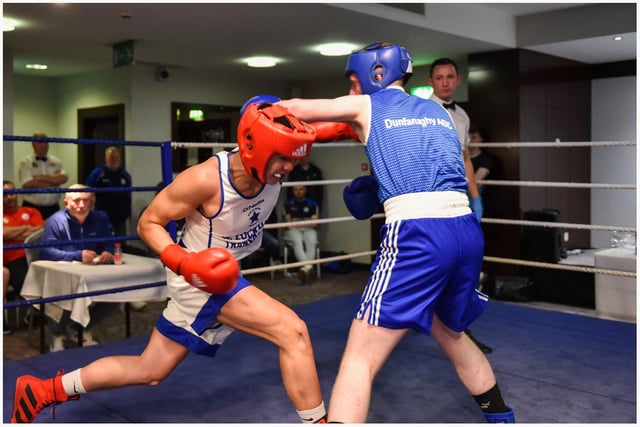 Danny Tuzi,Star Of The Sea lands a blow on Anthony Dooghan Dunfanaghy B C in this Youth 2 75 kg bout at the Maldron.