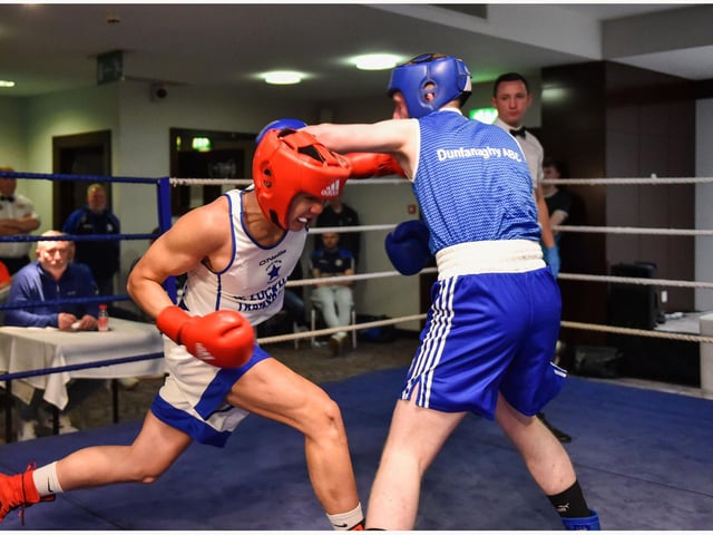 Danny Tuzi,Star Of The Sea lands a blow on Anthony Dooghan Dunfanaghy B C in this Youth 2 75 kg bout at the Maldron.