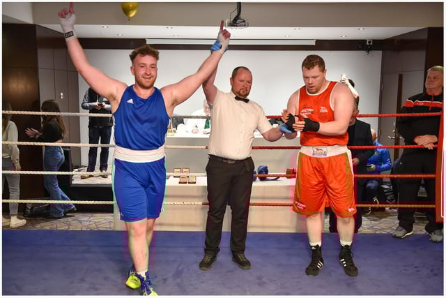 Conal Mc Erlean ,Loup takes the decision over Springtown's B C Jack Devine in this 92kg bout.