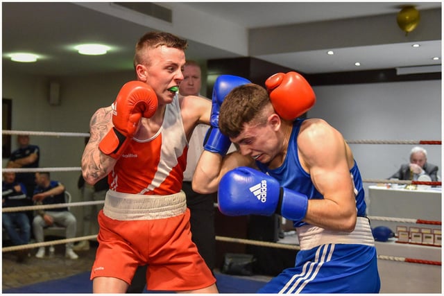 In on the fights of the night, Tiarnan Glenon, St Joseph's, scores well against Rys Owens ,Erne B C in this exchange.