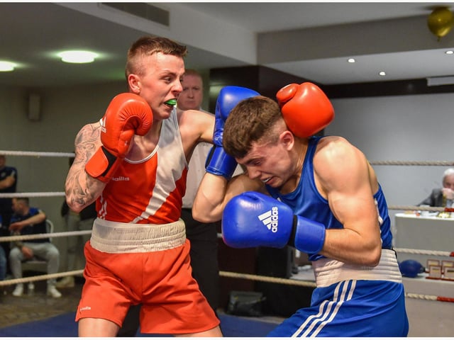 In on the fights of the night, Tiarnan Glenon, St Joseph's, scores well against Rys Owens ,Erne B C in this exchange.