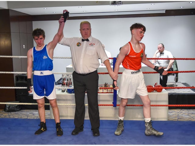 Reece Mitchell takes the decision over St.Joseph's Joe Cunningham Youth 1 57 k g