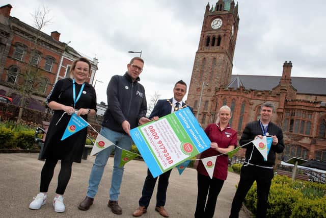 The Mayor of Derry City and Strabane District Council, Graham Warke marking 15 years of being Smoke Free in Northern Ireland, pictured outside the Guildhall on Monday morning Included from left are Ailish O'Neill, Public Health Authority, Conor Logue, Tobacco Officer, Derry City and Strabane District Council, Michelle Scott, Western Trust and Seamus Ward, Western Trust. (Photo: Jim McCafferty Photography)