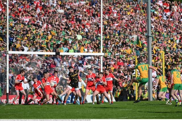 Derry players combine to prevent a late free from Donegal's Michael Murphy during the final minute of Sunday's Ulster Final in Clones. (Photo by Stephen McCarthy/Sportsfile)
