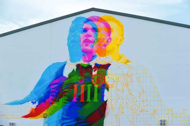 A mural of Irish international footballer James McClean, by Dublin artist Aches, is near completion in Central Drive, Creggan. The mural is part of Feile Derry’s ‘Graffiti on the Walls’ initiative. Photograph: George Sweeney. DER2224GS – 027