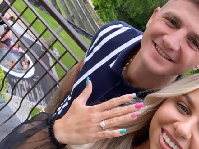 CONGRULATIONS  . . .  Connor Coyle and his fiancée Eva after their engagement at the Galgorm this week.
