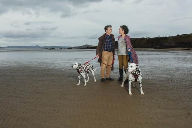 Harry Kerr with wife Martha McCulloch and their dogs Kiki and Django. Photo: Pure Purple Studios.