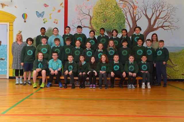 P7 pupils at Oakgrove Primary School with teacher Mrs Lally, on the right, and teaching assistant Mrs M. Wray. DER22019GS – 049