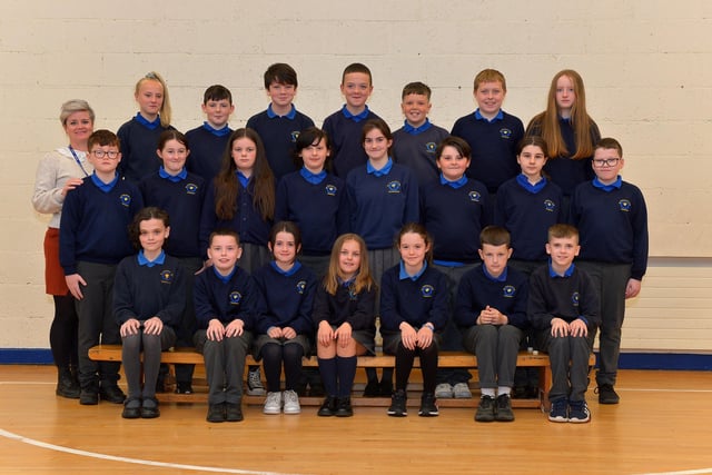 Ms McCauley with her P7 class at St Therese’s Primary School. DER222GS – 011