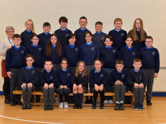 Ms McCauley with her P7 class at St Therese’s Primary School. DER222GS – 011