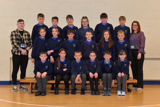 Miss McCaul and Mr Kelly, teaching assistant with their P7 class at St Therese’s Primary School. DER222GS – 012