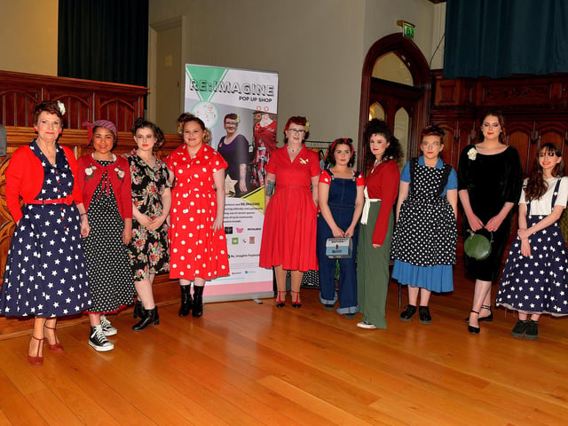 Elaine Duffy, proprietor of Vintage Star clothing, fifth from the right, pictured with students from the North West Regional College who modelled her range of vintage clothing at the Amelia Earhart Vintage Fashion Show, in the Guildhall on Saturday afternoon last. Photo: George Sweeney. DER2220GS – 075