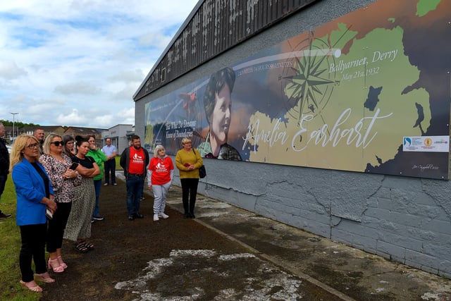 Some of the attendance at the unveiling of a mural commemorating the 90th Anniversary of the landing of Amelia Earhart in Derry on the gable wall of the Eurospar ( Gallaigh Co-Op) on Friday afternoon last.  Photo: George Sweeney.  DER2220GS – 063