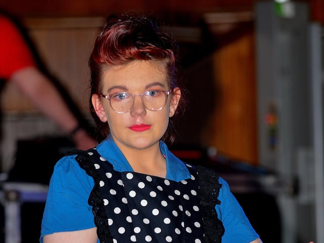 A student from the North West Regional College models clothing from the 1920s and 1930s at the Amelia Earhart Vintage Fashion Show held in the Guildhall on Saturday afternoon last. Photo: George Sweeney. DER2220GS – 079
