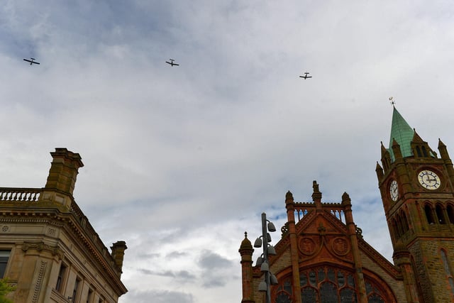 Airplanes take part in an aviation flypast tribute, over Derry’s city centre and Guildhall Square on Saturday afternoon last, marking the 90th Anniversary of Amelia Earhart’s historic landing in Gallagher’s field, Ballyarnett. Photo: George Sweeney.  DER2220GS – 085