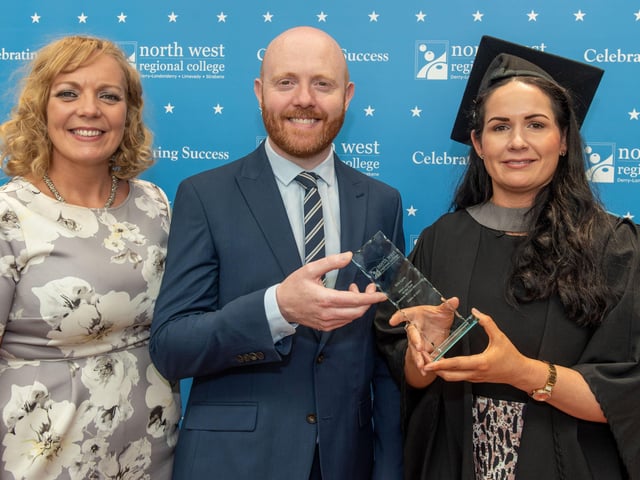 NWRC's Business Skills Manager Sinead Hawkins presents the award in memory of her father Seamus McCaul for the Access Diploma in Combined Studies Adult Learner of the Year to Erin Lynn, also pictured is event MC Barra Best.