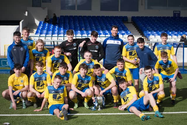Under 18s NI Cup winning squad with coach, Mr Mark Scoltock).