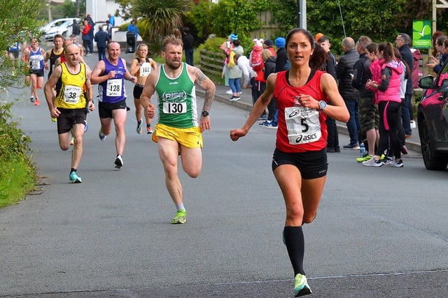 Catherine Whoriskey, City of Derry Spartans, out paces competitors during the Furey Insurance Buncrana 5Km on Wednesday evening last. Photo: George Sweeney.  DER2222GS – 052