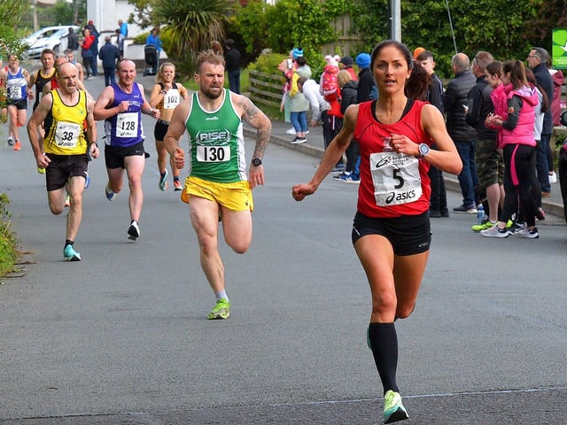 Catherine Whoriskey, City of Derry Spartans, out paces competitors during the Furey Insurance Buncrana 5Km on Wednesday evening last. Photo: George Sweeney. DER2222GS – 052