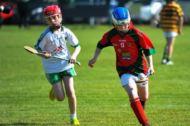 Action from Carndonagh against Sean MacCumhail, Ballybofey during the Seán Mellon Hurling Festival at Páirc Na Magha. Photo: George Sweeney.  DER2223GS – 139