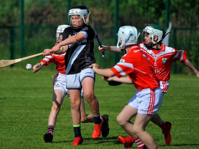 Kevin Lynchs’ take on Loughgiel Shamrocks during the Seán Mellon Hurling Festival at Páirc Na Magha on Saturday. Photo: George Sweeney.  DER2223GS – 135