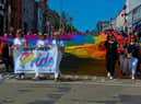The colourful Inishowen Pride Parade makes it way along Lower Main Street in Buncrana on Sunday afternoon last. Photograph: George Sweeney. DER2224GS – 022