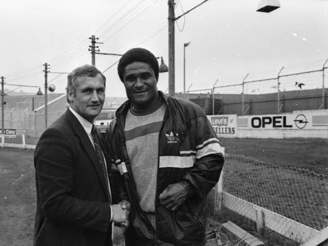 The late Derry City captain Dougie Wood pictured with Benfica and Portugal legend and icon, Eusébio when Benfica arrived at Brandywell in 1989.