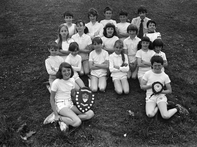 Young sports winners celebrating a win in June 1982.