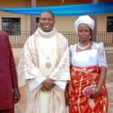 Fr Cajetan with his parents at his ordination.